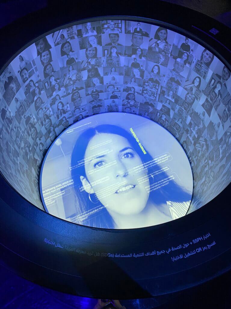 Looking into one of the bollards with printed graphics around the inner edge and digital screen in the base of the unit